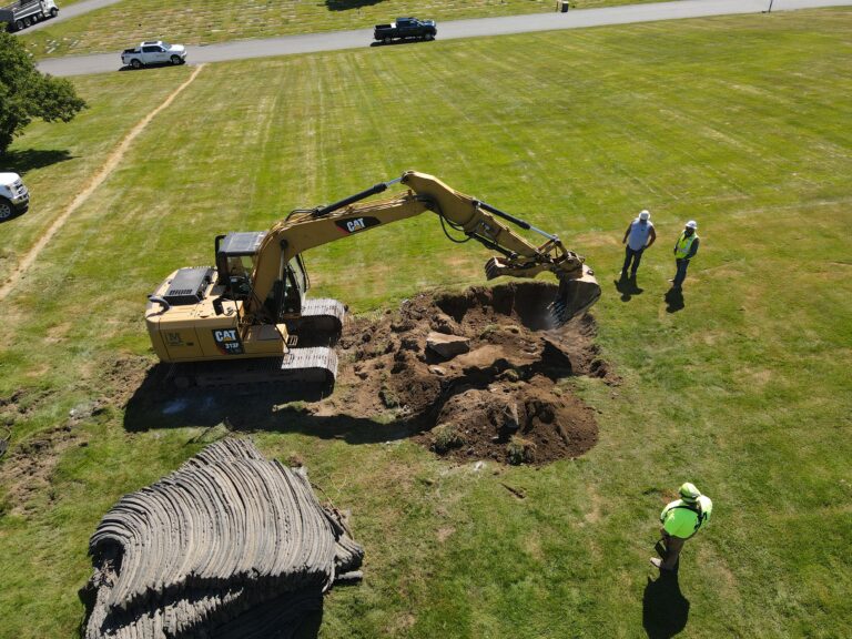 excavator rock drilling construction